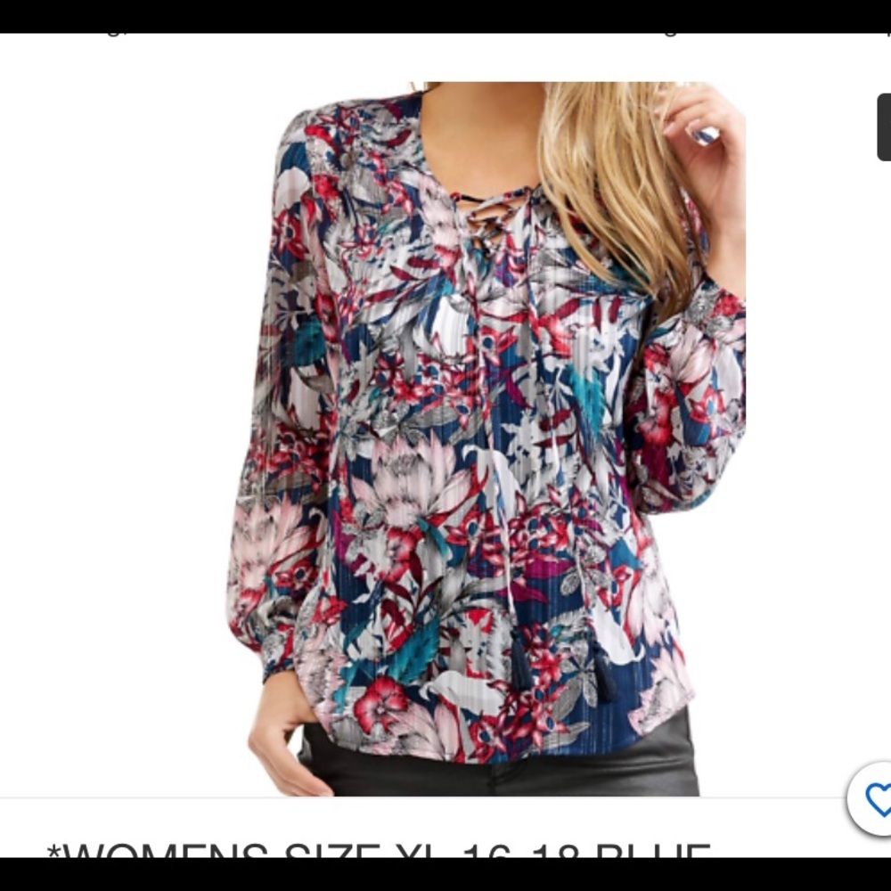 Women’s blouse with metallic piping.